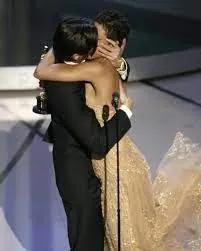 Halle Berry kissed Adrien Brody at the Oscars.